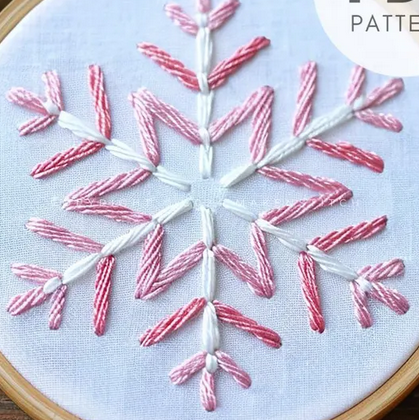 pink and white embrodery snowflake